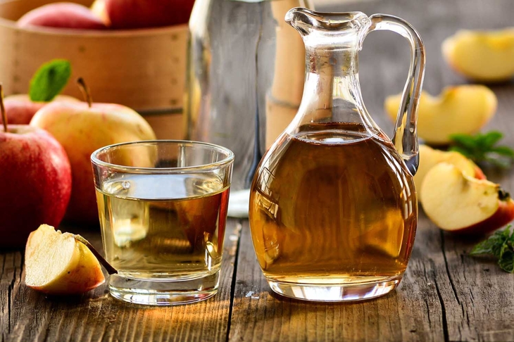 Apple cider vinegar still life