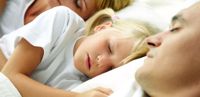 Sleeping with Mom and Dad may Prevent Obesity