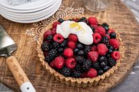 Glazed Bumbleberry Pie in Coconut Hazelnut Crust with Lemon Yogurt Drizzle