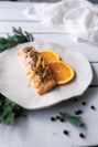 Sockeye Salmon Steamed in Parchment with Juniper, Orange, and Rosemary